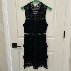 Lulus black cocktail dress knee length.